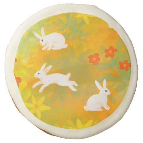 White bunnies on a flower field sugar cookie