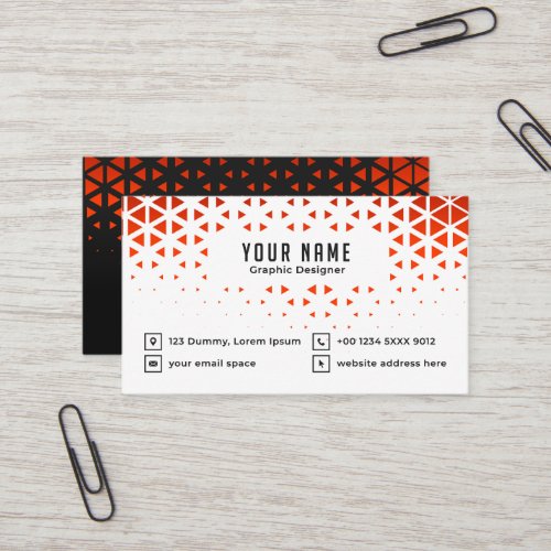 white business card with red triangle shapes