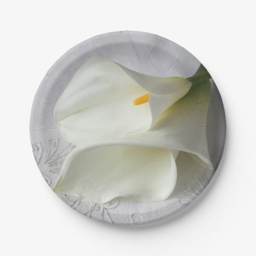 White calla lilies on linen paper plates