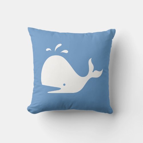 white CARTOON whale  on  blue pillow