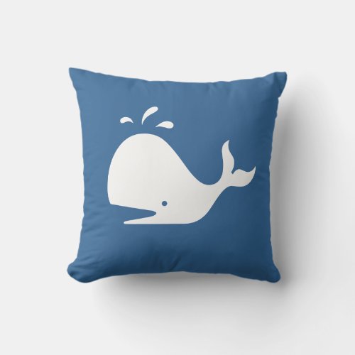 white CARTOON whale  on medium blue pillow