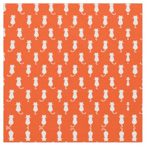 White Cat Isolated on Orange Polka Dot Pattern Fabric