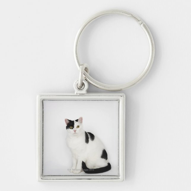 White cat with black spots keychain (Front)