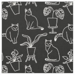 White cats on black fabric