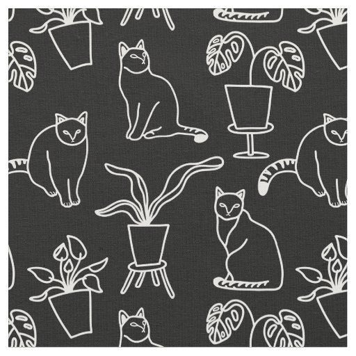 White cats on black fabric