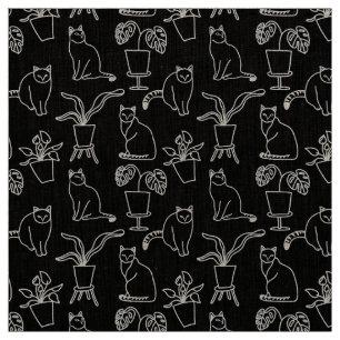 White cats on black fabric