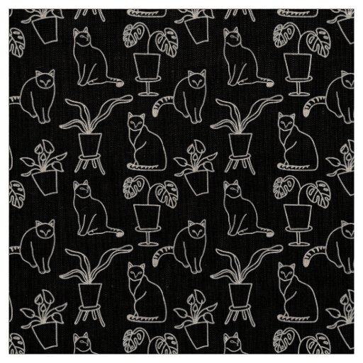 White cats on black fabric