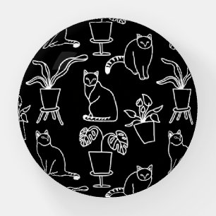 White cats on black paperweight