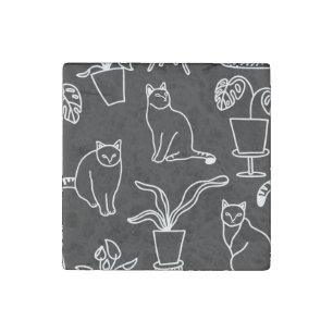 White cats on black stone magnet