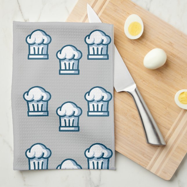 White chef hats on grey kitchen towel (Quarter Fold)