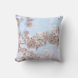 White cherry blossom under clear blue sky in the m throw pillow