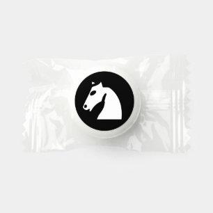White chess horse on black life saver® mints