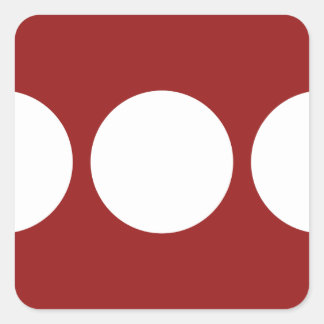 White Circles on Red Square Sticker