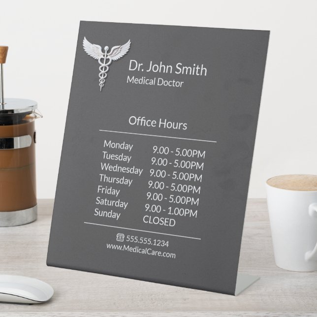 White Clean Detailed Caduceus Medical Opening Hour Pedestal Sign (In SItu)