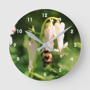 White Columbine Flower And Bumble Bee Round Clock