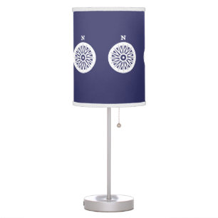 White Compos N north on blue background Table Lamp