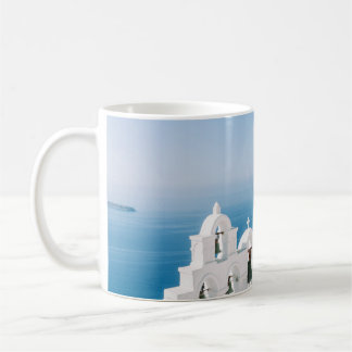White concrete building near body of water in the coffee mug