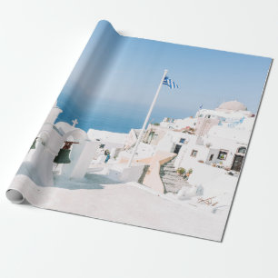 White concrete building near body of water in the wrapping paper