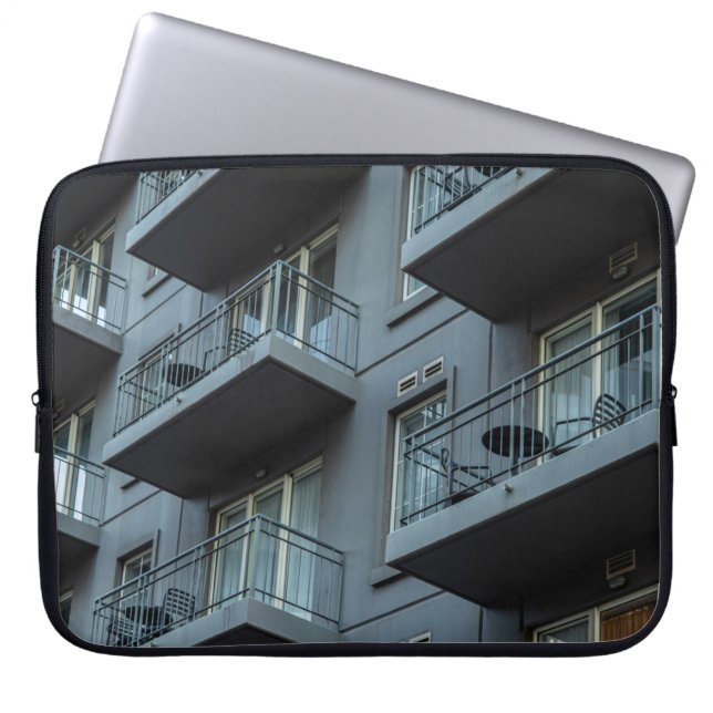 WHITE CONCRETE BUILDING WITH WHITE METAL RAILINGS LAPTOP SLEEVE (Front)