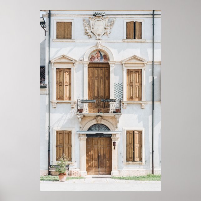 WHITE CONCRETE BUILDING WITH WOODEN DOORS AND WIND POSTER (Front)