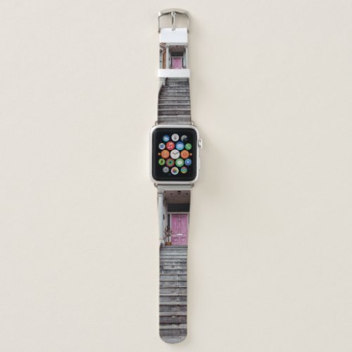 WHITE CONCRETE HOUSE SHOWING CLOSED PURPLE WOODEN  APPLE WATCH BAND