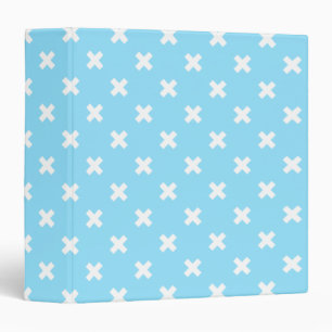 White cross stitches on baby blue 3 ring binder