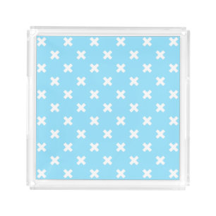White cross stitches on baby blue acrylic tray