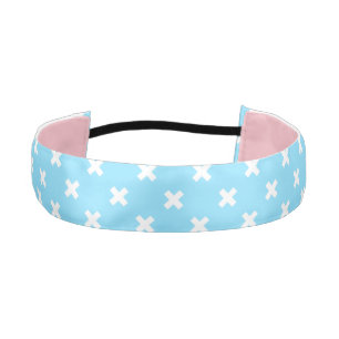 White cross stitches on baby blue athletic headband