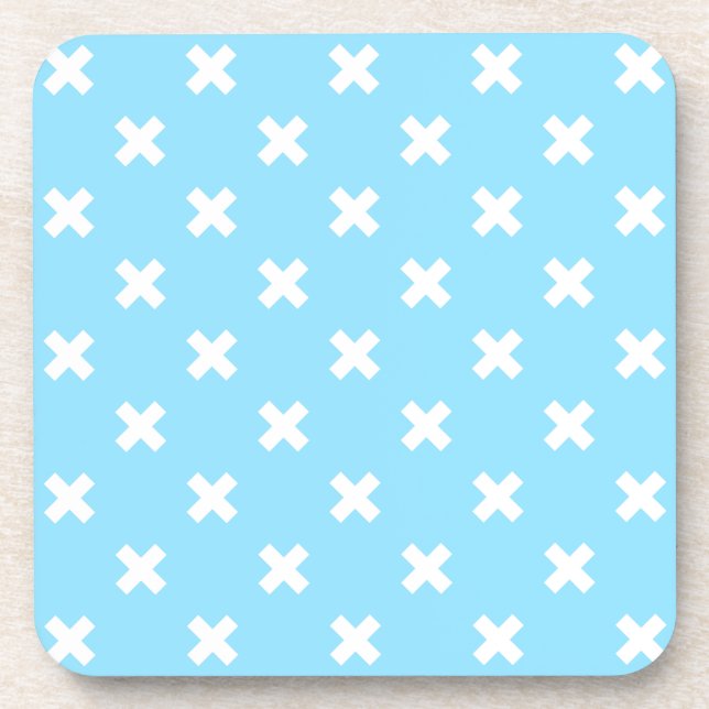 White cross stitches on baby blue beverage coaster (Front)