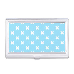 White cross stitches on baby blue business card case