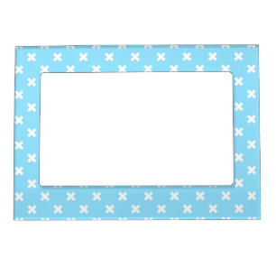 White cross stitches on baby blue magnetic frame