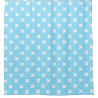 White cross stitches on baby blue