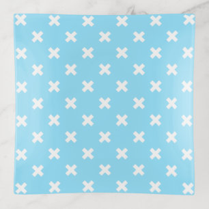 White cross stitches on baby blue trinket tray
