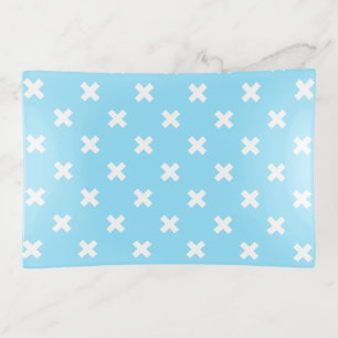 White cross stitches on baby blue trinket tray
