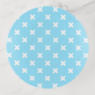 White cross stitches on baby blue trinket tray