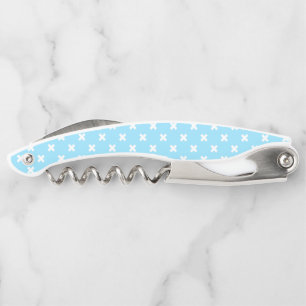 White cross stitches on baby blue waiter's corkscrew