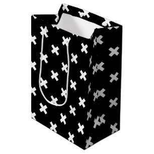 White cross stitches on black medium gift bag