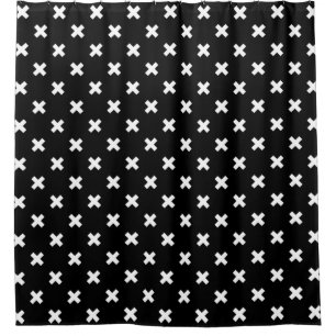 White cross stitches on black shower curtain