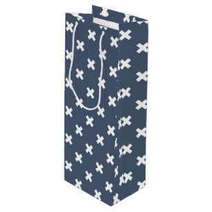 White cross stitches on blue-gray wine gift bag