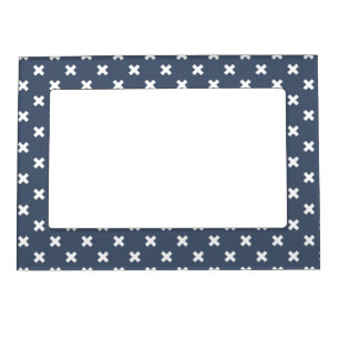 White cross stitches on blue-grey magnetic frame