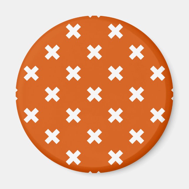 White cross stitches on burnt orange magnet (Front)