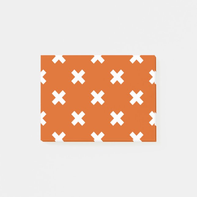 White cross stitches on burnt orange post-it notes (Front)