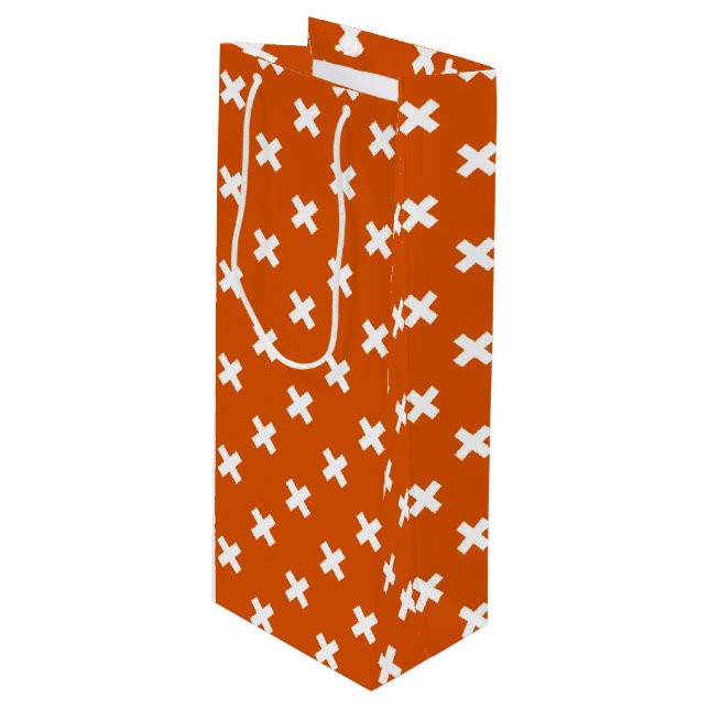 White cross stitches on burnt orange wine gift bag (Front Angled)