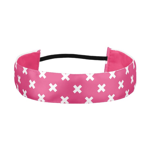 White cross stitches on fuchsia athletic headband (Front)