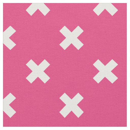 White cross stitches on fuchsia fabric