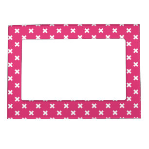 White cross stitches on fuchsia magnetic frame