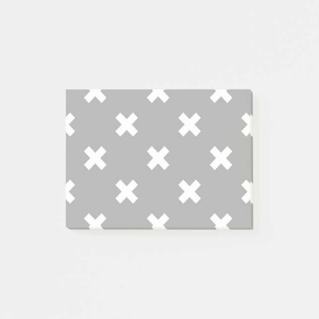 White cross stitches on gray post-it notes (Front)