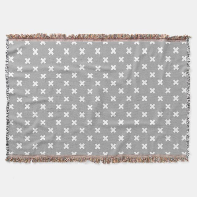 White cross stitches on gray throw blanket (Front)