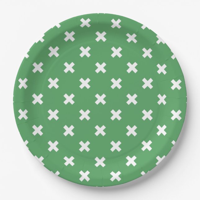 White cross stitches on green paper plates (Front)