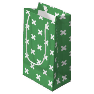 White cross stitches on green small gift bag
